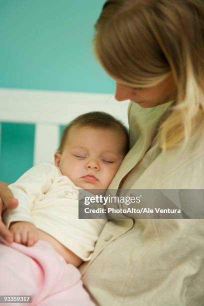 Mother Rocking 170 Mother Rocking Baby To Sleep Stock Photos, High-Res Pictures, and ...