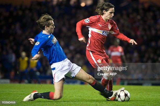 Stuttgart's Sebastian Rudy vies with Rangers Sasa Papac during the UEFA Champions League football match on November 24, 2009 in Glasgow. AFP...