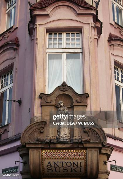 Shrine on Suski House facade, Krakow Historic Centre , Poland.