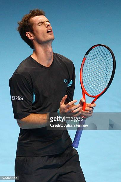 Andy Murray of Great Britain reacts during the men's singles second round match against Roger Federer of Switzerland during the Barclays ATP World...
