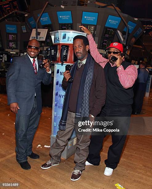 Boyz II Men singers Wanya Morris, Shawn Stockman, and Nathan Morris on the floor of the New York Stock Exchange after ringing the closing bell at the...