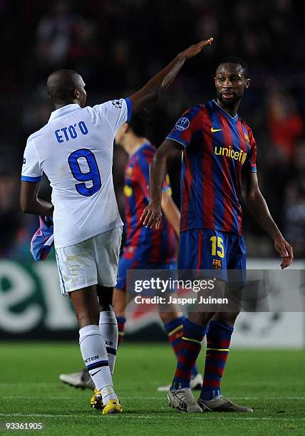 Samuel Eto'o of Inter Milan greets his former teammate Seydou Keita of FC Barcelona at the end of the UEFA Champions League group F match between FC...