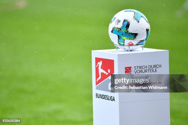 The Second Bundesliga logo is seen with the match ball and the campaign Strich durch Vorurteile during the Second Bundesliga match between FC...
