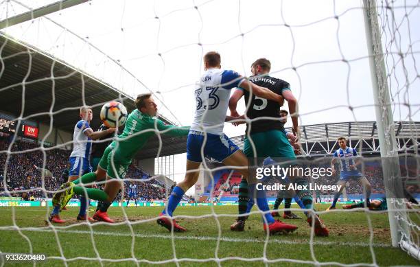 Pierre-Emile Hojbjerg of Southampton scores their first goal past goalkeeper Christian Walton of Wigan Athletic during The Emirates FA Cup Quarter...