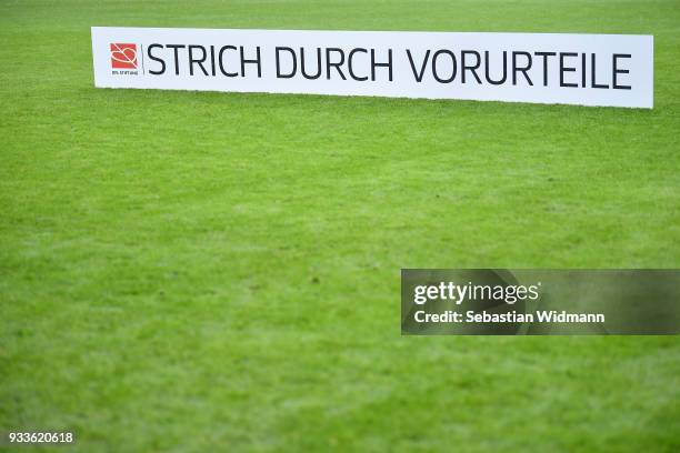 Sign for the campaign Strich durch Vorurteile is seen prior to the Second Bundesliga match between FC Ingolstadt 04 and SG Dynamo Dresden at Audi...