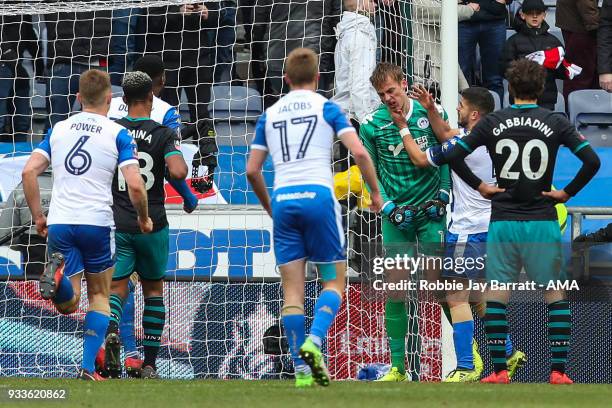 Christian Walton of Wigan Athletic celebrates after saving a penalty from Manolo Gabbiadini of Southampton during The Emirates FA Cup Quarter Final...