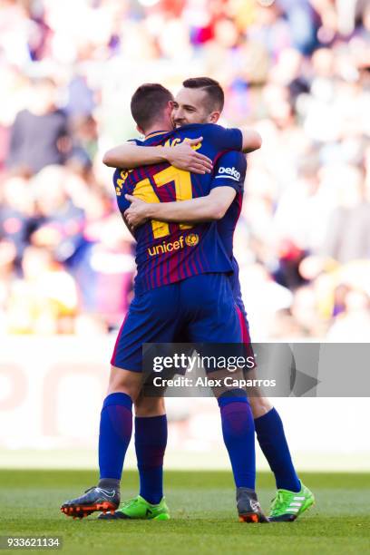 Paco Alcacer of FC Barcelona celebrates with his teammate Jordi Alba after scoring the opening goal during the La Liga match between Barcelona and...