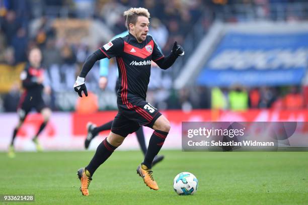 Thomas Pledl of Ingolstadt plays the ball during the Second Bundesliga match between FC Ingolstadt 04 and SG Dynamo Dresden at Audi Sportpark on...