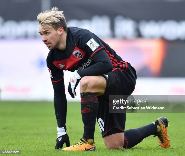 Thomas Pledl of Ingolstadt kneels on the pitch during the Second Bundesliga match between FC Ingolstadt 04 and SG Dynamo Dresden at Audi Sportpark on...
