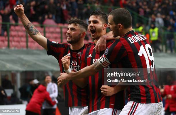 Andre Silva of AC Milan celebrates his goal with his team-mates Patrick Cutrone and Leonardo Bonucci during the serie A match between AC Milan and AC...