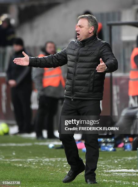 Metz's French head coach Frederic Hantz reacts during the French L1 football match between Metz and Nantes on March 18 at the Saint-Symphorien...