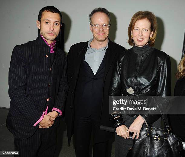 Dan Macmillan, Hans Ulrich Obrist and Julia Peyton-Jones attend the private view of Damien Hirst's latest exhibition 'Nothing Matters', at the White...