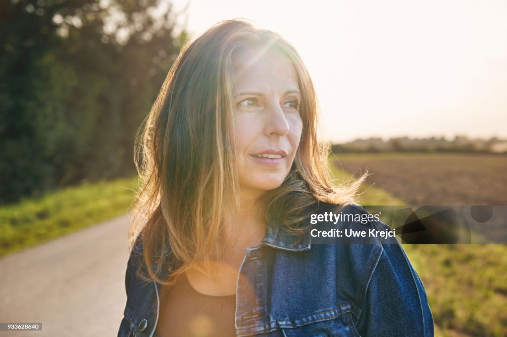 Portrait of mature woman in the countryside