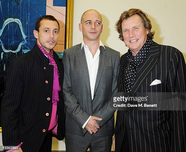 Dan Macmillan, Dinos Chapman and Theo Fennell attend the private view of Damien Hirst's latest exhibition 'Nothing Matters', at the White Cube...
