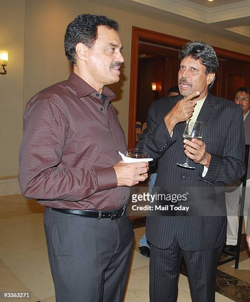 Cricketers Dilip Vengsarkar and Kapil Dev at a party to celebrate former cricketer Azharuddin's success in politics in Mumbai on Sunday, November 22,...