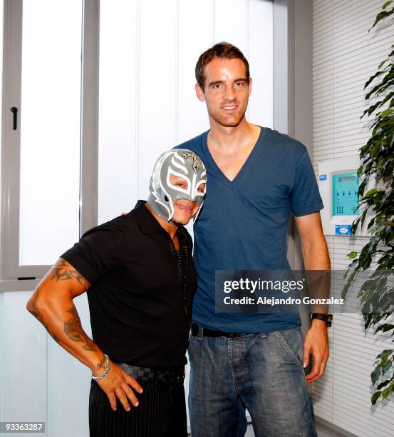 Rey Misterio poses with Christoph Metzelder of Real Madrid as he visits Valdebebas on November 13, 2009 in Madrid, Spain.