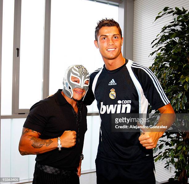 Rey Misterio poses with Cristiano Ronaldo of Real Madrid as he visits Valdebebas on November 13, 2009 in Madrid, Spain.