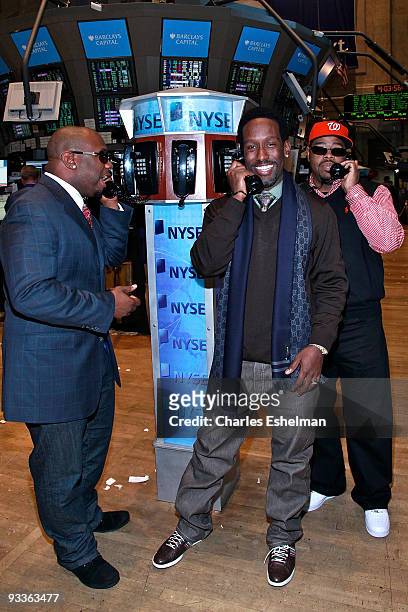 Group Boyz II Men' Wanya Morris, Shawn Stockman and Nathan Morris tour the trading floor at the New York Stock Exchange on November 24, 2009 in New...