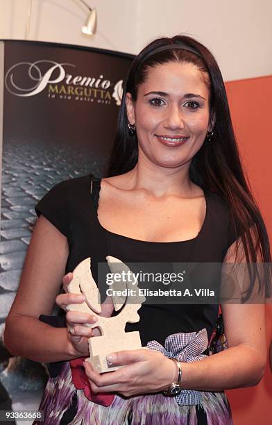 Actress Barbara Tabita shows her award during the '2009 Margutta Awards' at Margutta RistorArte on November 24, 2009 in Rome, Italy.