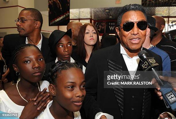 Jermaine Jackson walks the red carpet as he arrives for a special screening for students of local schools of the documentary "This is It.'' and also...