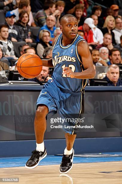 Earl Boykins of the Washington Wizards handles the ball against the Oklahoma City Thunder during the game on November 20, 2009 at the Ford Center in...