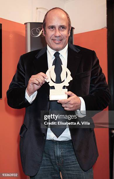 Writer Federico Moccia shows his award during the '2009 Margutta Awards' at Margutta RistoArte on November 24, 2009 in Rome, Italy.