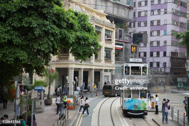 double-decker trams in hong kong - wan chai stock pictures, royalty-free photos & images