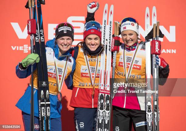 Jessica Diggins of USA, Heidi Weng of Norway, Ingvild Flugstad Oestberg of Norway at podium Ladies 10.0 km Pursuit Free at Lugnet Stadium on March...