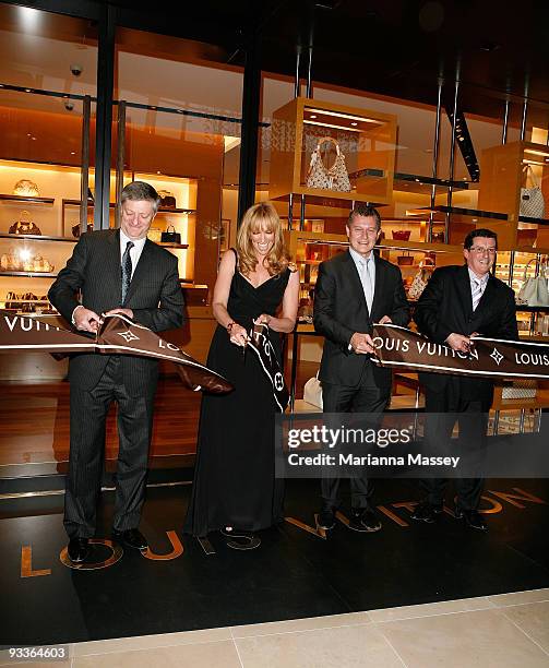 Toni Collette cuts the ribbon for the official opening of the new Louis Vuitton store at the Chadstone Shopping Centre along with Jean Baptiste...