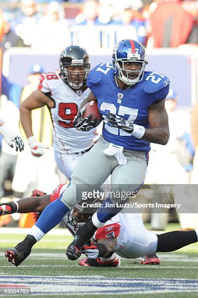 Brandon Jacobs of the New York Giants carries the ball against the Atlanta Falcons during a NFL game on November 22, 2009 at Giants Stadium in East...