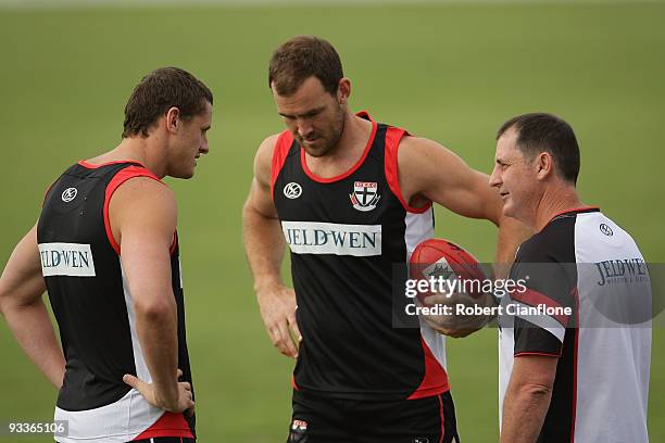 Saints coach Ross Lyon talks with Michael Gardiner and Steven King during a St Kilda Saints AFL training session held at Linen House Oval on November...