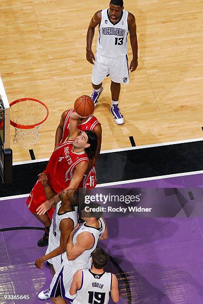 Luis Scola of the Houston Rockets puts up a shot against Kenny Thomas of the Sacramento Kings during the game on November 13, 2009 at Arco Arena in...