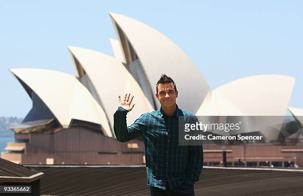 Singer Robbie Williams poses during a media call ahead of his appearance at tomorrow's ARIA Awards, at the Park Hyatt on November 25, 2009 in Sydney,...