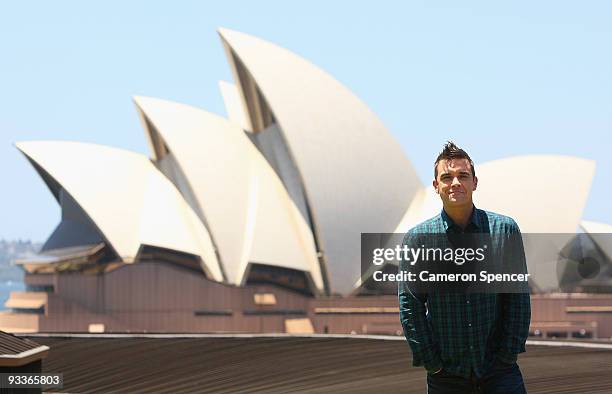 Singer Robbie Williams poses during a media call ahead of his appearance at tomorrow's ARIA Awards, at the Park Hyatt on November 25, 2009 in Sydney,...