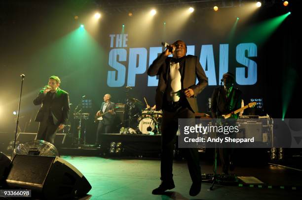 Terry Hall, Horace Panter, Neville Staple and Lynval Golding of The Specials perform on stage at Hammersmith Apollo on November 24, 2009 in London,...