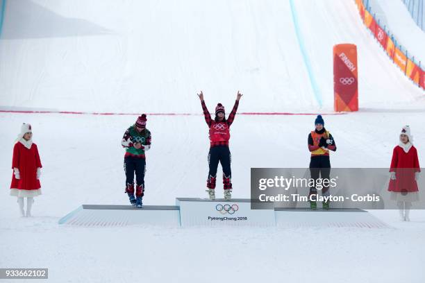 Silver medal winner Brittany Phelan, , of Canada, gold medal winner Kelsey Serwa of Canada salutes the crowd and bronze medal winner Fanny Smith, ,...
