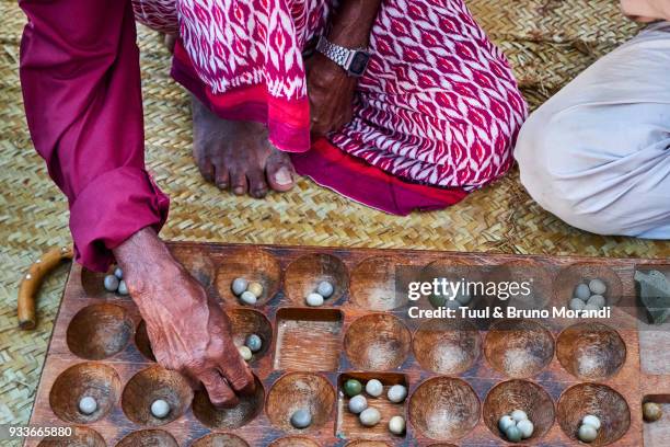 kenya, lamu island, lamu town, traditional african game - africa game stock pictures, royalty-free photos & images