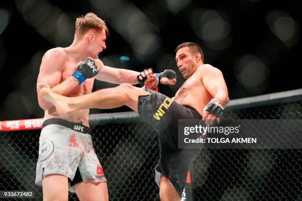 Russia's Alexander Volkov fights Brazil's Fabrico Werdum in their Heavyweight fight during the UFC Fight Night at the O2 Arena in London on March 17,...