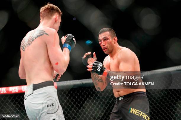 Russia's Alexander Volkov fights Brazil's Fabrico Werdum in their Heavyweight fight during the UFC Fight Night at the O2 Arena in London on March 17,...