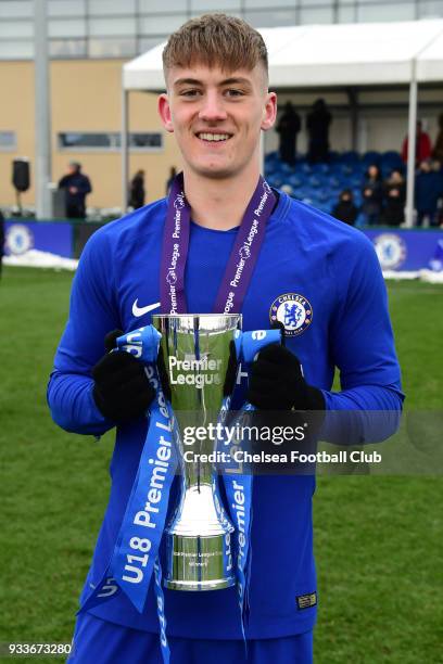 Charlie Brown of Chelsea with the trophy during the Chelsea v Tottenham Hotspur U18 Premier League Cup Final match at Chelsea Training Ground on...