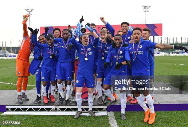 Captain Conor Gallagher of Chelsea lifts the trophy with the team during the Chelsea v Tottenham Hotspur U18 Premier League Cup Final match at...