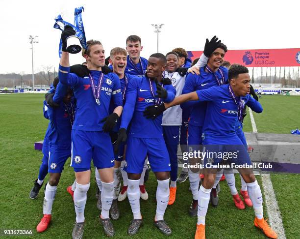 Captain Conor Gallagher of Chelsea lifts the trophy with the team during the Chelsea v Tottenham Hotspur U18 Premier League Cup Final match at...