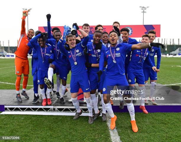 Captain Conor Gallagher of Chelsea lifts the trophy with the team during the Chelsea v Tottenham Hotspur U18 Premier League Cup Final match at...