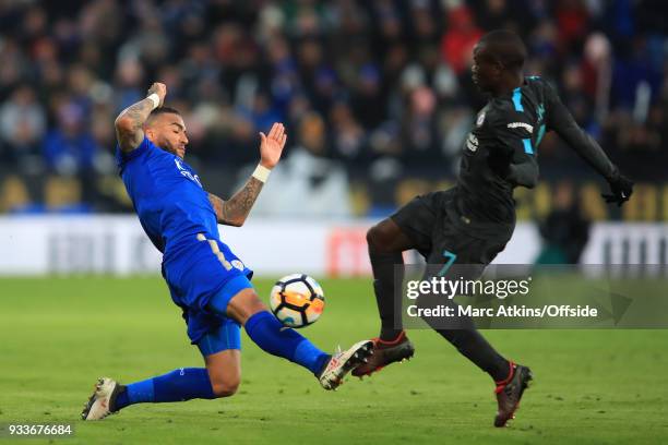 Danny Simpson of Leicester City in action with N'Golo Kante of Chelsea during the Emirates FA Cup Quarter Final match between Leicester City and...