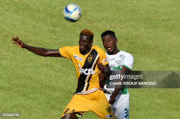 Ivory Coast's Mohamed Lamine Ndao vies with Zambia's Fackson Kapumbu during their Confederation of African Football Champions League match between...