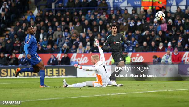 Alvaro Morata of Chelsea scores past Kasper Schmeichel of Leicester City to make it 0-1 during The Emirates FA Cup Quarter Final tie between...