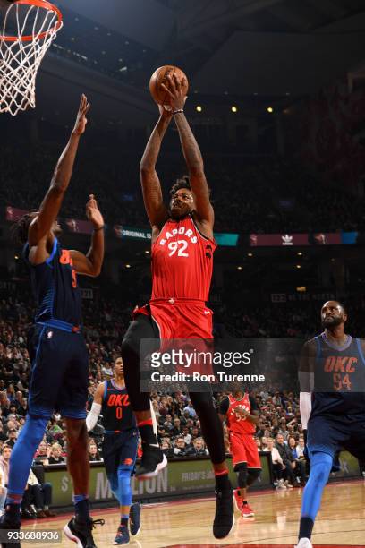 Lucas Nogueira of the Toronto Raptors goes to the basket against the Oklahoma City Thunder on March 18, 2018 at the Air Canada Centre in Toronto,...
