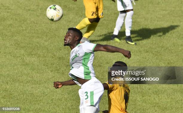 Zambia's Fackson Kapimbu heads the ball during the Confederation of African Football Champions League match between Asec d'Abidjan and Zesco United...