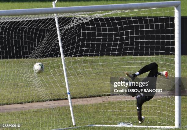 Asec's goalkeeper Abdoul Karim Cisse concedes a goal during the CAF Champions league football match between Asec d'Abidjan and Zesco United of Zambia...