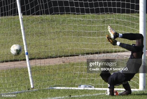 Asec's goalkeeper Abdoul Karim Cisse concedes a goal during the CAF Champions league football match between Asec d'Abidjan and Zesco United of Zambia...